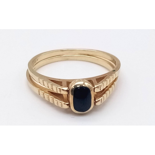 45 - 18K YELLOW GOLD SWITCH RING WITH ONYX ON ONE SIDE AND TURQUISE ON OTHER. TOTAL WEIGHT 4.1G.  SIZE S