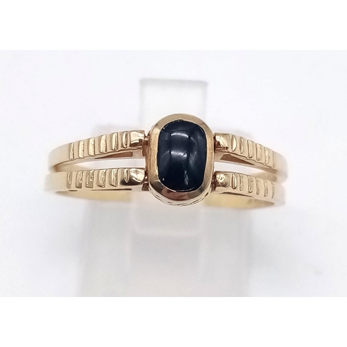 45 - 18K YELLOW GOLD SWITCH RING WITH ONYX ON ONE SIDE AND TURQUISE ON OTHER. TOTAL WEIGHT 4.1G.  SIZE S