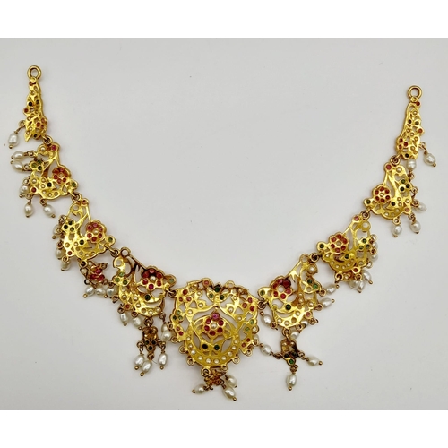 484 - A 20 k yellow gold necklace and pendant with seed pearls, emeralds and rubies (some stones missing) ... 