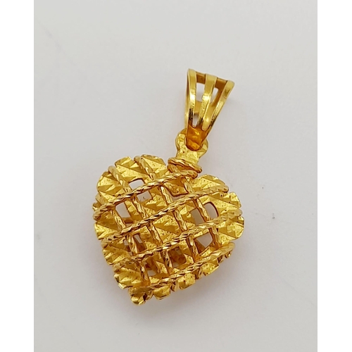 889 - A mixed lot consisting of:
22 K yellow gold pendant 
18 K yellow gold chain necklace with pendant an... 