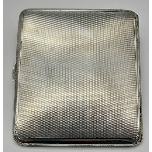 952 - A SOLID SILVER CIGARETTE CASE DATED 1938 AND HALLMARKED IN LONDON .  103.2gms    9.5 x 8cms