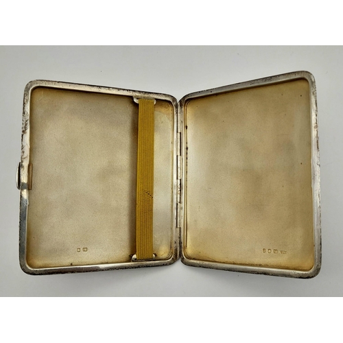 952 - A SOLID SILVER CIGARETTE CASE DATED 1938 AND HALLMARKED IN LONDON .  103.2gms    9.5 x 8cms