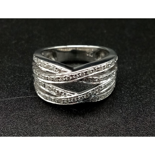 97 - 18K WHITE GOLD DIAMOND 4 ROW SPLIT BAND RING 0.50CT DIAMOND. TOTAL WEIGHT 6G.  SIZE L