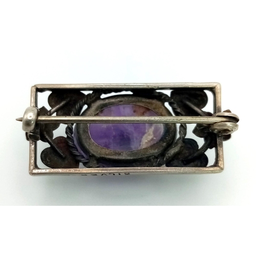 1000 - A Vintage or Antique Silver Rennie Mackintosh Design Amethyst Cabochon Brooch 3cm Wide,