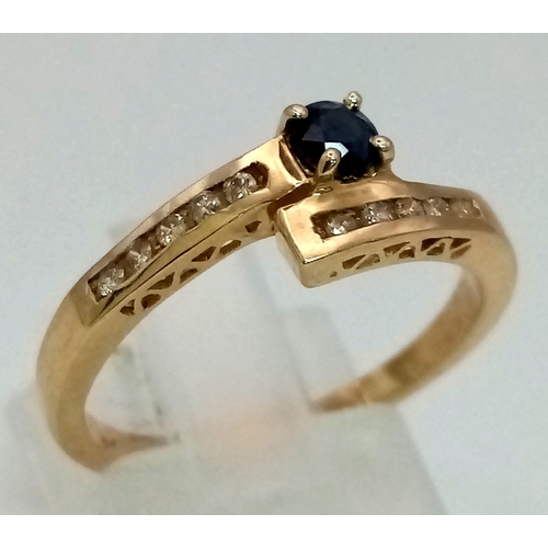 290 - 9K YELLOW GOL DIAMOND & SAPPHIRE RING. TOTAL WEIGHT 2.3G SIZE O