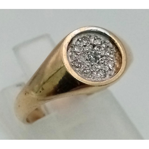 599 - 9K YELLOW GOLD DIAMOND SET SIGNET RING. TOTAL WEIGHT 2.6G.  SIZE K