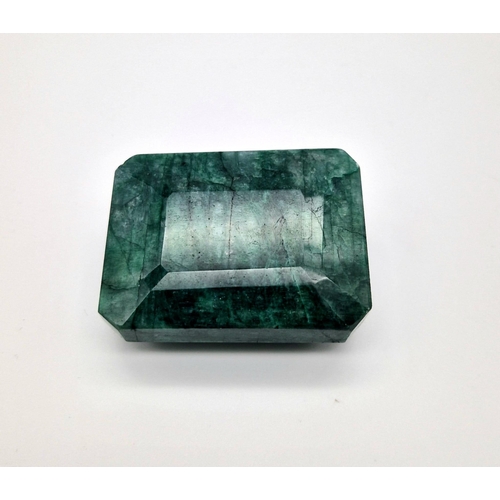 1417 - A Very Large 829ct Rectangular Shaped Step-Cut Emerald.  6.5 x 5cm.