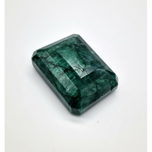 1417 - A Very Large 829ct Rectangular Shaped Step-Cut Emerald.  6.5 x 5cm.