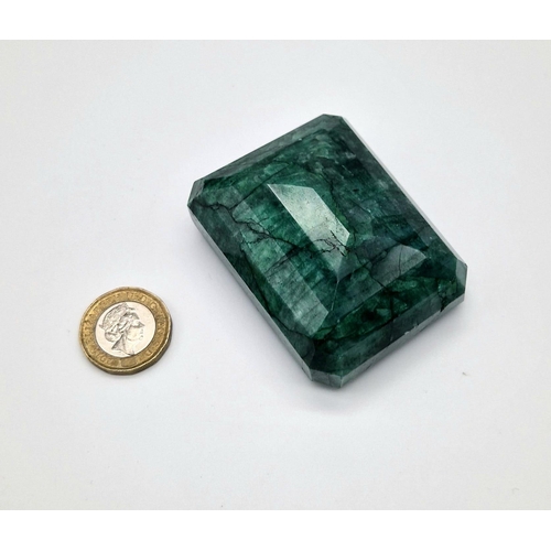 1417 - A Very Large 829ct Rectangular Shaped Step-Cut Emerald.  6.5 x 5cm.