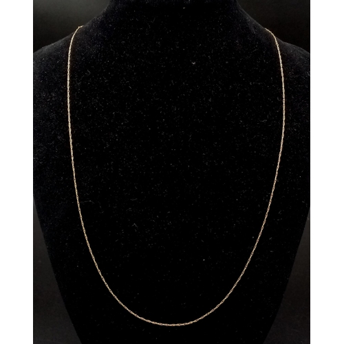 955 - A 9K Yellow Gold Delicate Link Necklace. 54cm. 0.7g