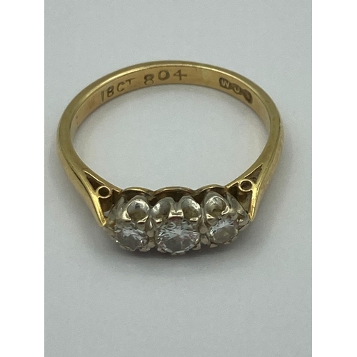 137 - Vintage 18 carat GOLD and DIAMOND RING having three diamonds set to top. complete with ring box.2.75... 