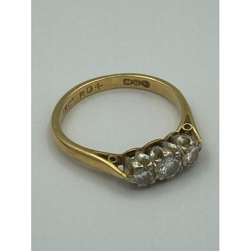 137 - Vintage 18 carat GOLD and DIAMOND RING having three diamonds set to top. complete with ring box.2.75... 