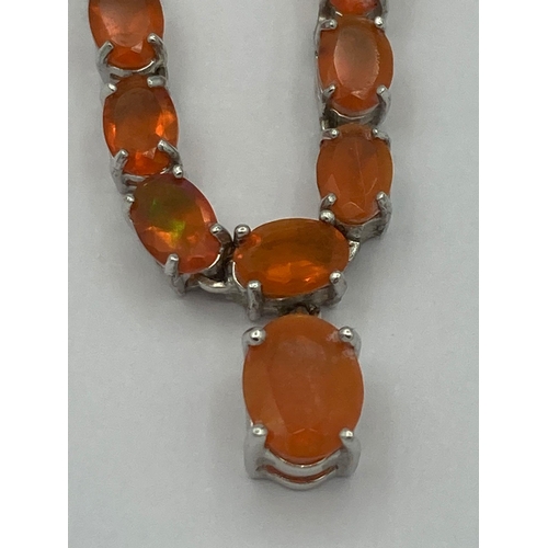 144 - Beautiful SILVER and CARNELIAN NECKLACE .Set with 34 oval cut orange CARNELIANS in individual silver... 