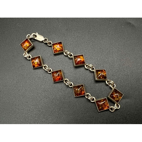 434 - STERLING SILVER AMBER BRACELET 11G