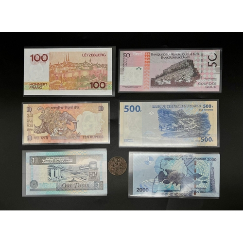 500 - A Rare Set of 6 Mint Condition World Bank Notes Plus 1 Antique Coin Comprising; 1) An Indian Mohatma... 