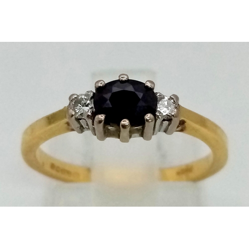 529 - 18K YELLOW GOLD DIAMOND & SAPPHIRE 3 STONE RING. TOTAL WEIGHT  2.42G.  SIZE K