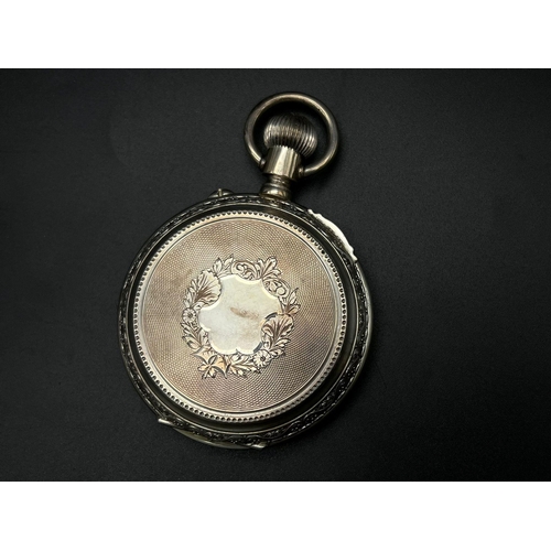 587 - A Vintage Possibly Antique Large Silver Pocket Watch. White dial with second sub dial. Top winder. I... 