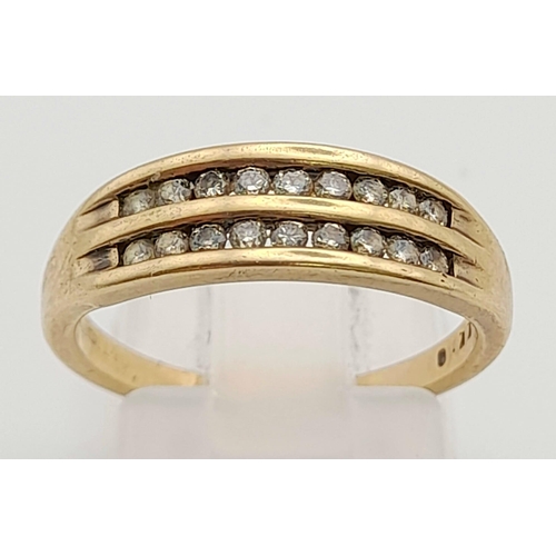 620 - 9K YELLOW GOLD 2 ROW DIAMOND RING. TOTAL WEIGHT 2.7G SIZE M