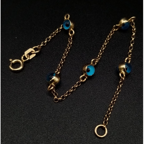 669 - 14K YELLOW GOLD EVIL EYE BRACELET 1.9G. 16CM LENGTH.