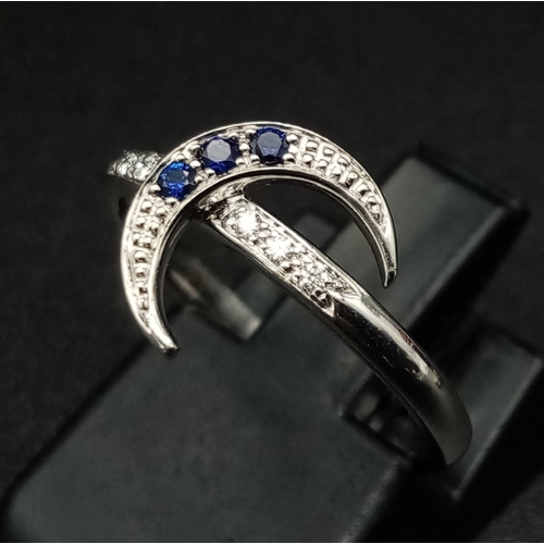 108 - 18K WHITE GOLD DIAMOND & SAPPHIRE MOON RING. TOTAL WEIGHT 1.94G.  SIZE J