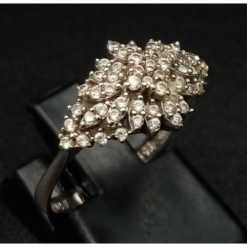 1101 - 18K WHITE GOLD DIAMOND CLUSTER RING. TOTAL WEIGHT 2.3G SIZE M