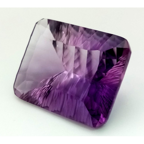 358 - A 31.26ct Concave Octagon Shaped, Clean Cut Eye African Amethyst Gemstone. Comes complete with GFCO ... 