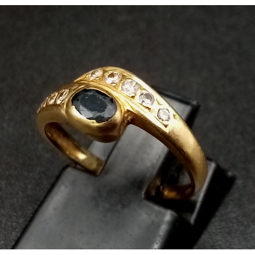 556 - 18K YELLOW GOLD DIAMOND & SAPPHIRE SNAKE FEEL RING. TOTAL WEIGHT 2.7G.  SIZE J