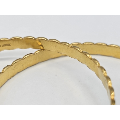 698 - Withdrawn
Two 22 K yellow gold bangles (weight: 35.8 g) AND two 21 K yellow gold bangles (weight: 34... 