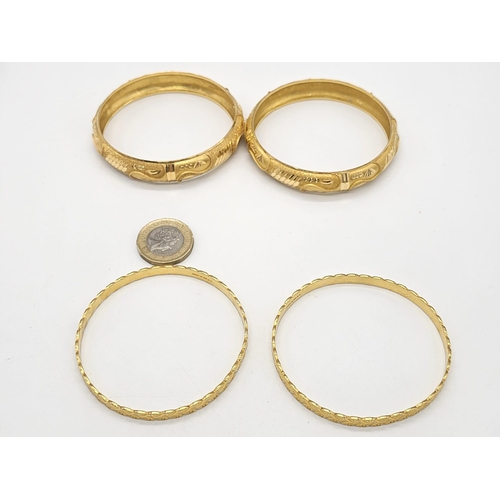 698 - Withdrawn
Two 22 K yellow gold bangles (weight: 35.8 g) AND two 21 K yellow gold bangles (weight: 34... 