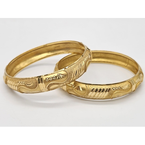 698 - Withdrawn
Two 22 K yellow gold bangles (weight: 35.8 g) AND two 21 K yellow gold bangles (weight: 34... 