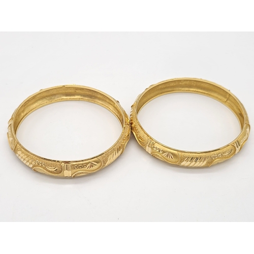 698 - Withdrawn
Two 22 K yellow gold bangles (weight: 35.8 g) AND two 21 K yellow gold bangles (weight: 34... 