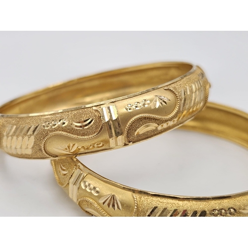 698 - Withdrawn
Two 22 K yellow gold bangles (weight: 35.8 g) AND two 21 K yellow gold bangles (weight: 34... 