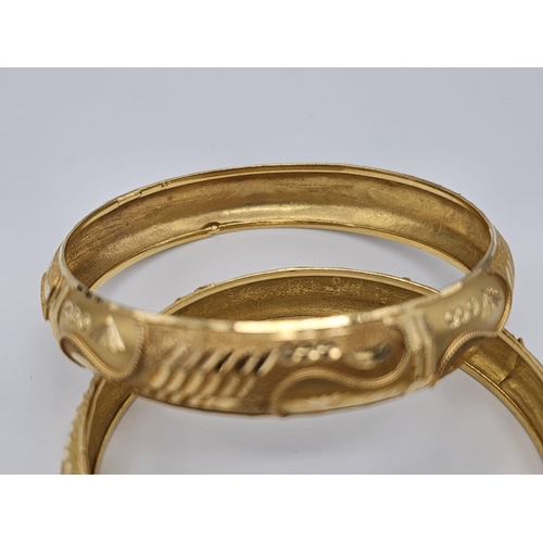 698 - Withdrawn
Two 22 K yellow gold bangles (weight: 35.8 g) AND two 21 K yellow gold bangles (weight: 34... 