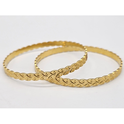 698 - Withdrawn
Two 22 K yellow gold bangles (weight: 35.8 g) AND two 21 K yellow gold bangles (weight: 34... 