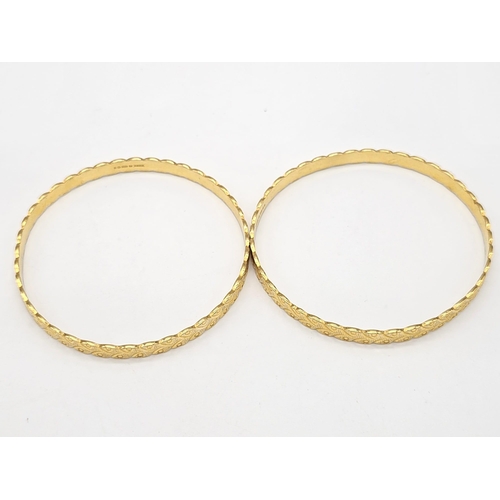 698 - Withdrawn
Two 22 K yellow gold bangles (weight: 35.8 g) AND two 21 K yellow gold bangles (weight: 34... 