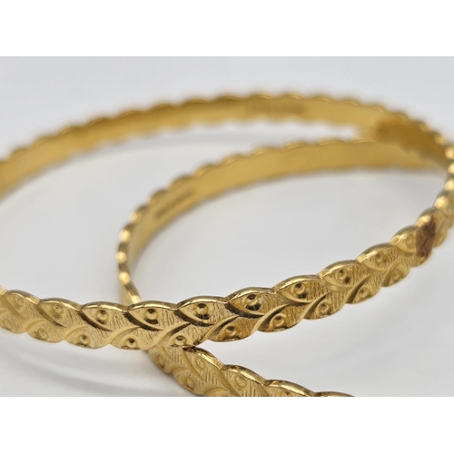 698 - Withdrawn
Two 22 K yellow gold bangles (weight: 35.8 g) AND two 21 K yellow gold bangles (weight: 34... 