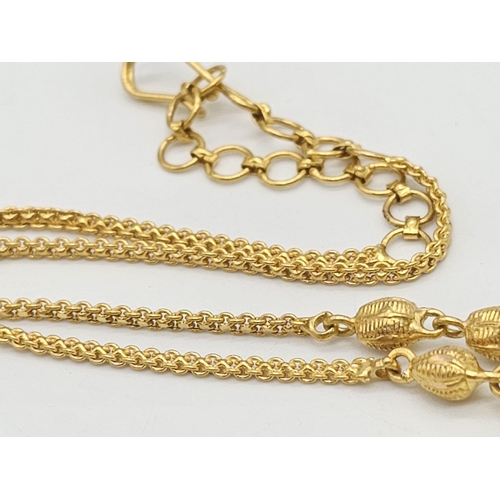 811 - A yellow gold mixed lot consisting of: 
22 K chain and six necklaces A/F
21 K bracelet and ring (siz... 