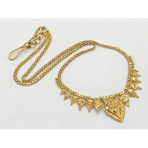 811 - A yellow gold mixed lot consisting of: 
22 K chain and six necklaces A/F
21 K bracelet and ring (siz... 