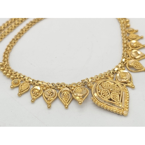 811 - A yellow gold mixed lot consisting of: 
22 K chain and six necklaces A/F
21 K bracelet and ring (siz... 