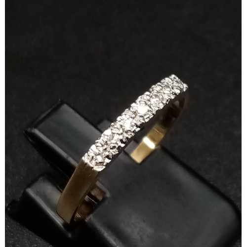 857 - 9K YELLOW GOLD DIAMOND SET BAND RING. TOTAL WEIGHT 1.3G.  SIZE N 1/2