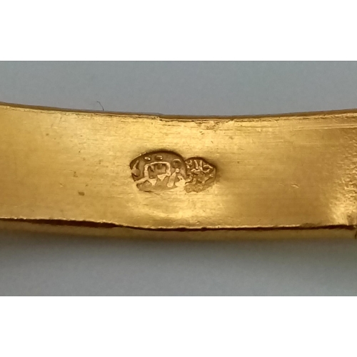 997 - A 21 K yellow gold bangle with a small damage. Weight: 11.2 g. REF: 010111967