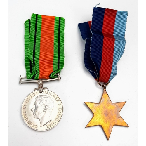 1047 - 2 WWII MEDALS WITH ORIGINAL RIBBONS,THE DEFENCE MEDAL PLUS A 1939 - 1945 STAR.