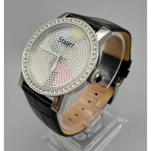 1307 - A Stauer Multi-Coloured Dial Watch. Black leather strap. Case - 38mm. Quartz movement. In good condi... 