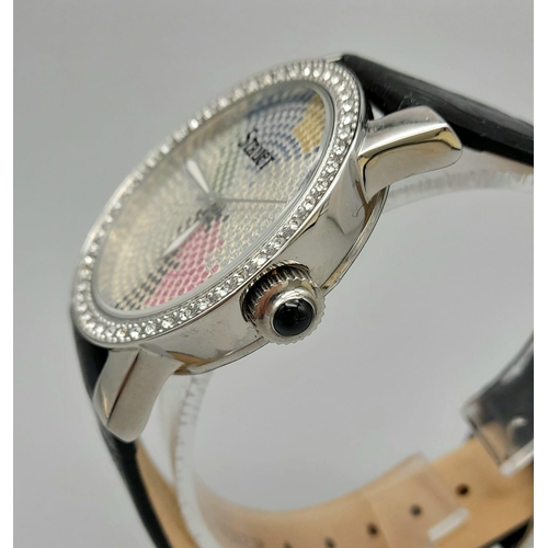 1307 - A Stauer Multi-Coloured Dial Watch. Black leather strap. Case - 38mm. Quartz movement. In good condi... 