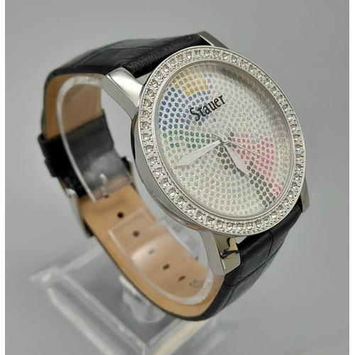 1307 - A Stauer Multi-Coloured Dial Watch. Black leather strap. Case - 38mm. Quartz movement. In good condi... 