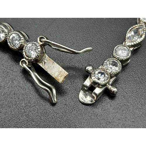 1081 - STERLING SILVER STONE SET BRACELET WITH 2 SAFETY CATCHES 11.1G