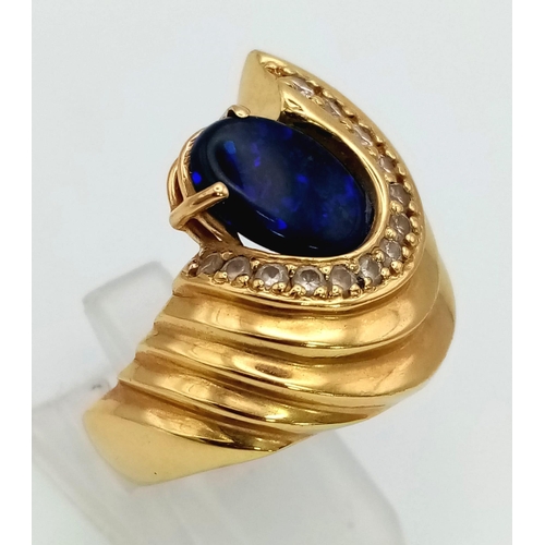 1426 - A Glamorous Vintage 18K Yellow Gold, Diamond and Lapis Lazuli Ladies Ring. A stunning central purple... 