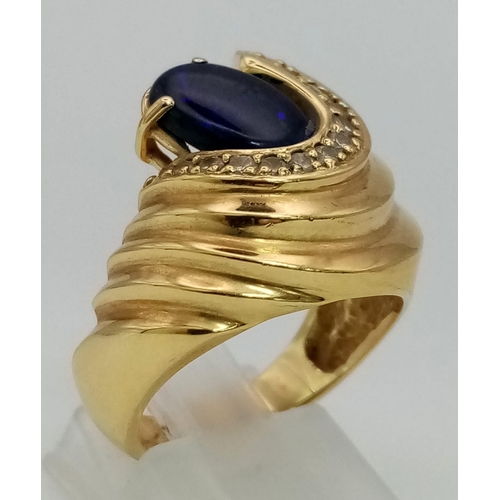 1426 - A Glamorous Vintage 18K Yellow Gold, Diamond and Lapis Lazuli Ladies Ring. A stunning central purple... 