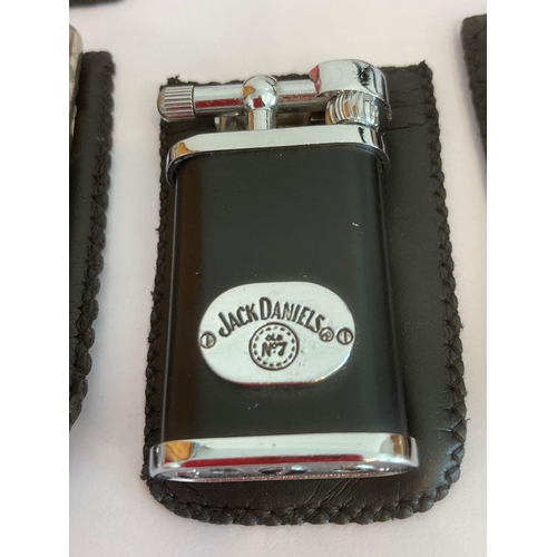 862 - Selection of vintage lighters in pouches to include a Jack Daniel‘s ,Gauloises,Paris,etc. UK Buyers ... 