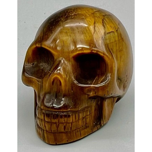 1227 - A Hand-Carved Tigers Eye Skull Figure. Ornament or paperweight. 6cm